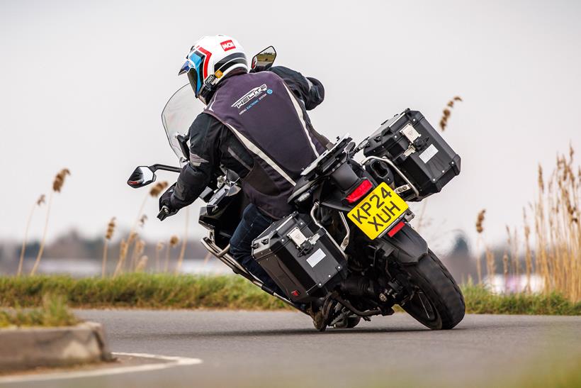 rider with hard panniers