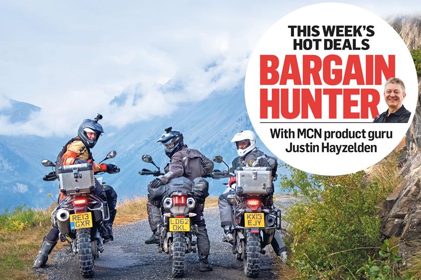 Three riders posing on a mountain pass, with MCN's Bargain Hunter logo