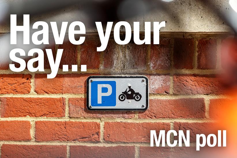 Motorcycle parking sign on a wall