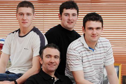 William and Michael Dunlop, pictured with their father Robert and brother Daniel, have withdrawn from the Isle of Man TT (Pic: Pacemaker Press)