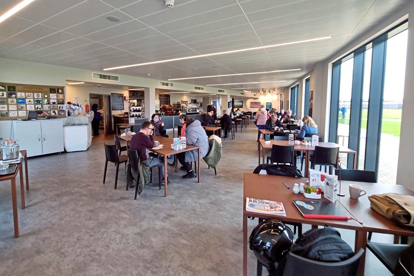 Inside the Bomber Command Centre with people dining at tables