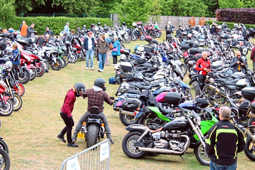 Lots of parked bikes and people