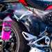 Muc-Off spray bottle being applied to a bike