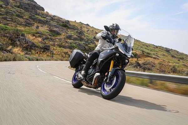 2025-on Yamaha Tracer 7 GT cruising down a mountain road