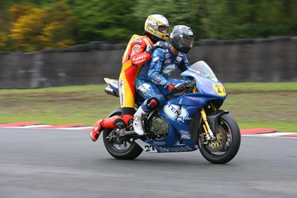 Michael Howarth, seen here givnig Guy Martin a lift at Oulton Park, will not race at Snetterton