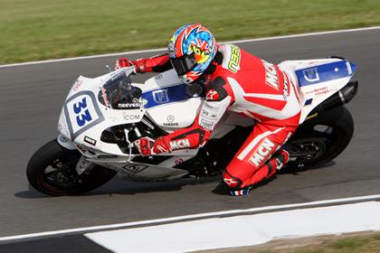 MCN Senior Road Tester Michael Neeves starts from 12th position on the grid for the Henderson R1 Cup support race for the British GP