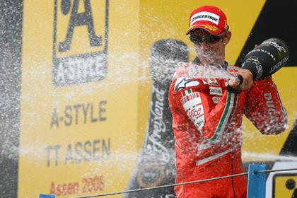 Casey Stoner's title defence is well and truly back on track after his third win of the season in Assen today