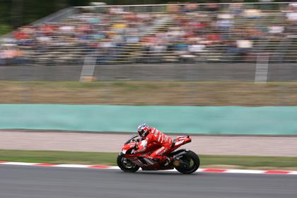 Casey Stoner stormed to a fourth consecutive pole position in today’s qualifying session