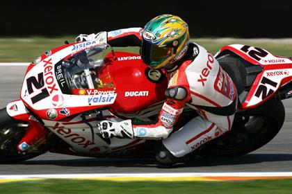 Troy Bayliss extended his championship lead with a win in race one