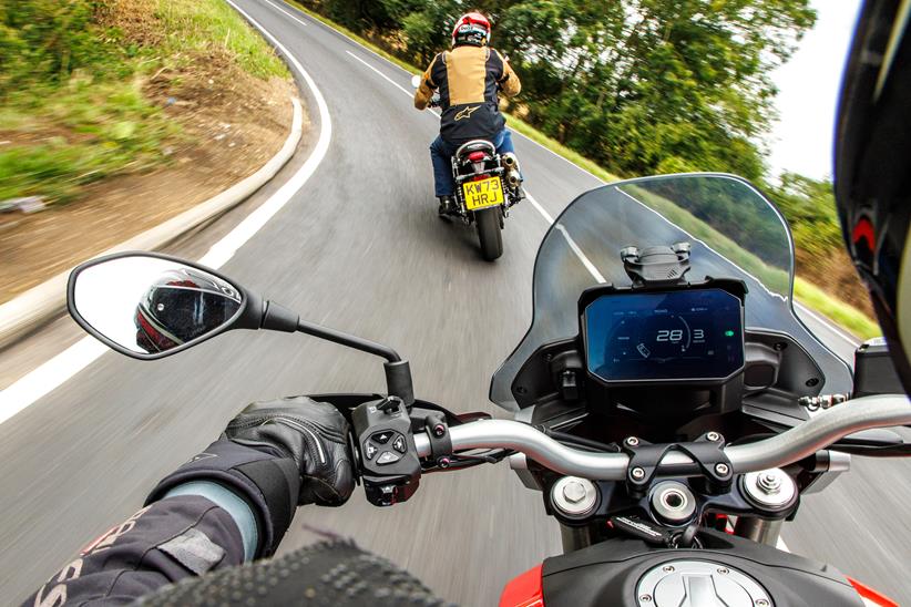 Riding a motorbike on-board shot