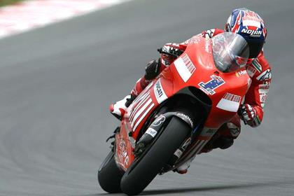 Casey Stoner takes pole position at the Brno GP