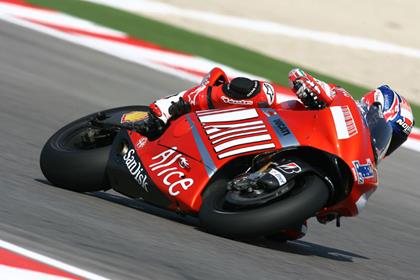 Casey Stoner smashed the lap record to take pole at Phillip Island