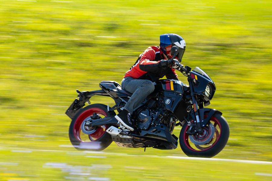 2025 Suzuki GSX-8TT, on the gas on a twisty road 
