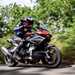 2025 Bimota Tesi H2 Tera, traversing a country road, rolling image of right side