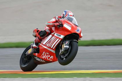 Casey Stoner takes the win in Valencia