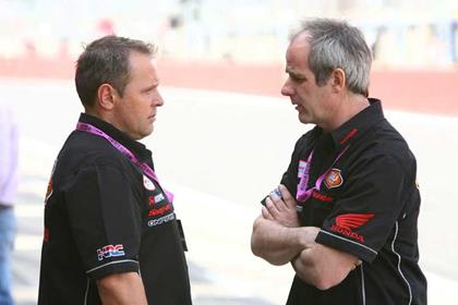 Havier Beltran (right) speaking with Adrian Gorst, Cal Crutchlow's chief mechanic