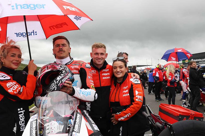Scott Redding alongside Hager PBM Ducati owners Jordan and Frank Bird, and his wife, Jacey Redding.