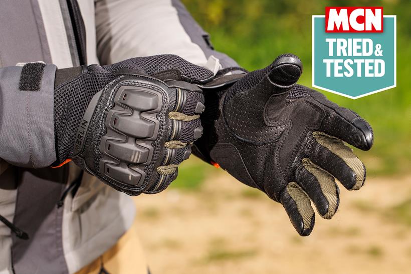 Merlin Jura gloves being pulled on