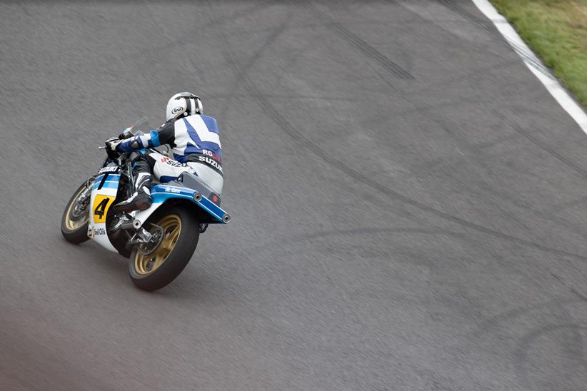 Classic Suzuki RG500 cornering at Cadwell Park
