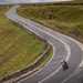 2025-on BMW R1300RS cruising down a country road