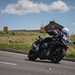2025-on BMW R1300RS cutting into a corner