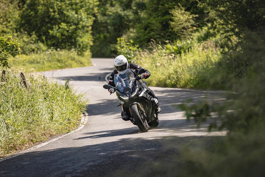 2025-on BMW R1300RS cutting into a corner