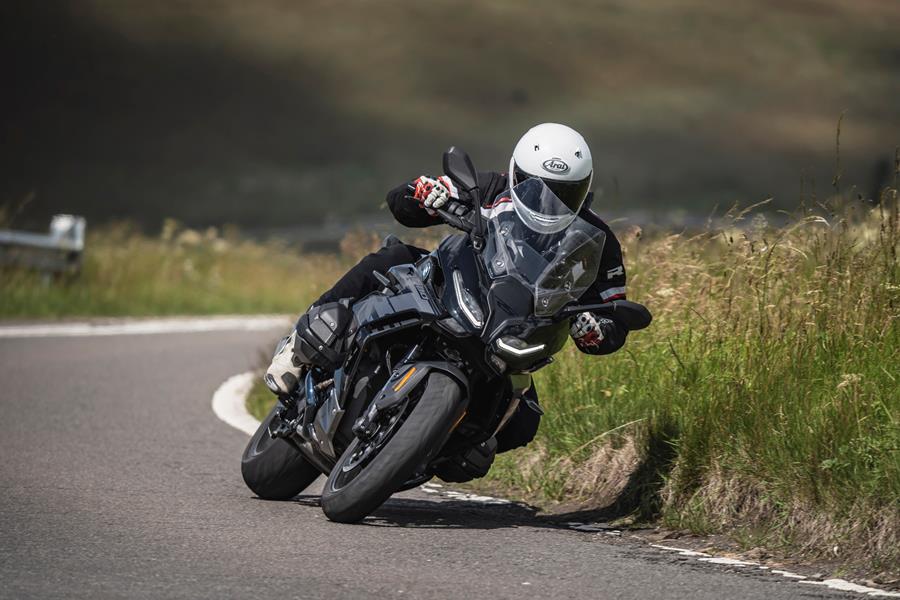 2025-on BMW R1300RS leaning into a corner