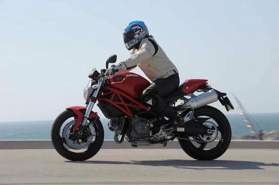 Ducati Monster 696 side on riding shot