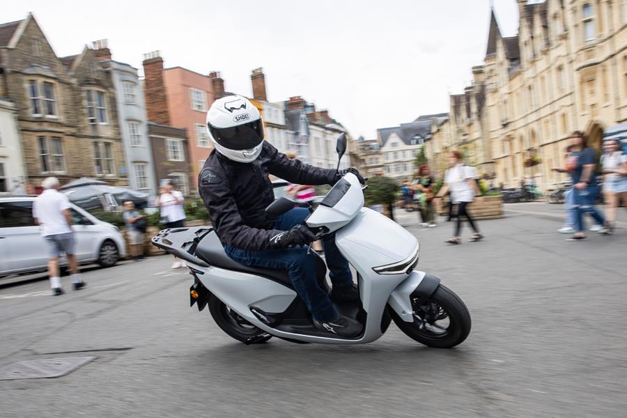 2025 Honda CUV e, slow speed turning in a busy street