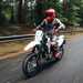 2025-on Suzuki DR-Z4SM poised ready for a corner to carve