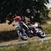 2025-on Suzuki DR-Z4SM blasting down a lane