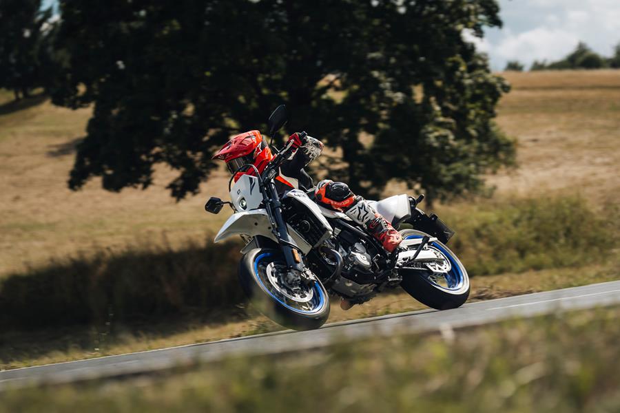 2025-on Suzuki DR-Z4SM blasting down a lane