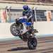 Pulling a wheelie aboard the Suzuki GSX-R1000R