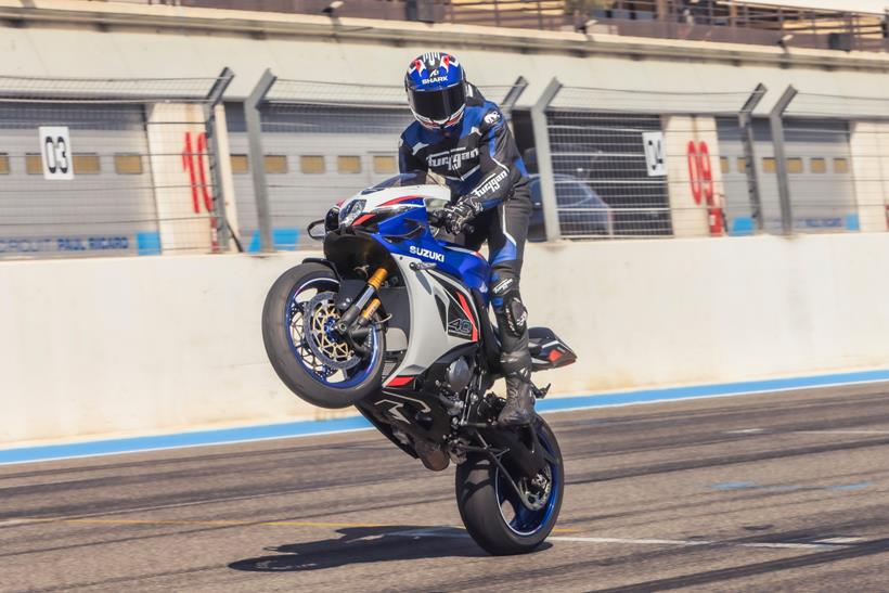 Pulling a wheelie aboard the Suzuki GSX-R1000R
