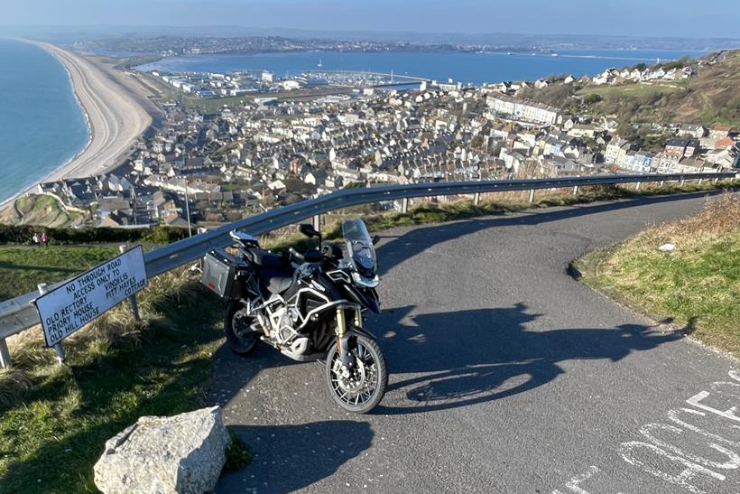 Triumph Tiger 1200 Rally Explorer parked in scenic lay-by