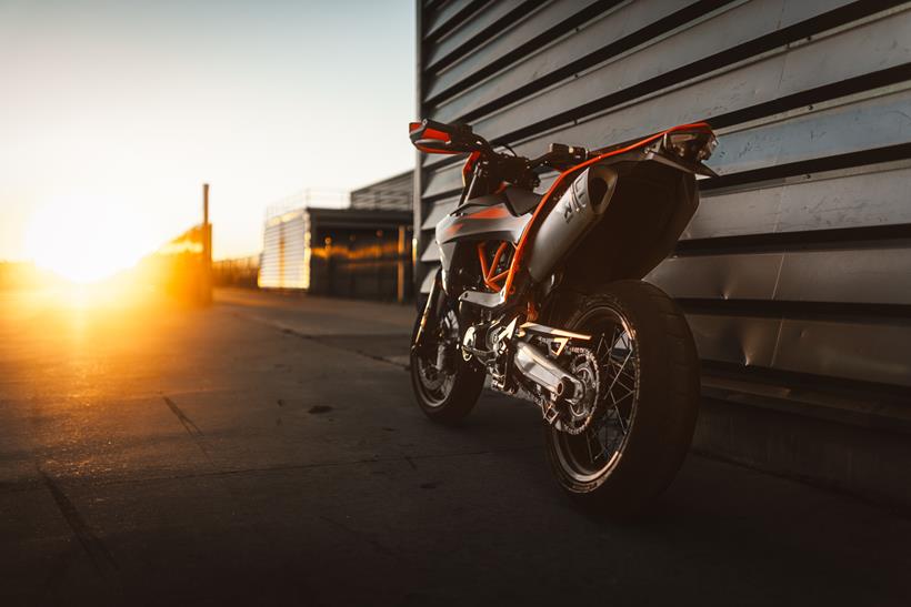 KTM 690 SMC R parked up alongside a building