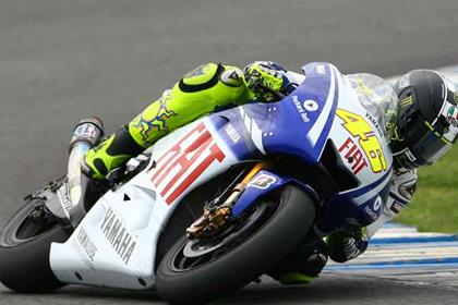 Valentio Rossi says Friday practice will return in 2010