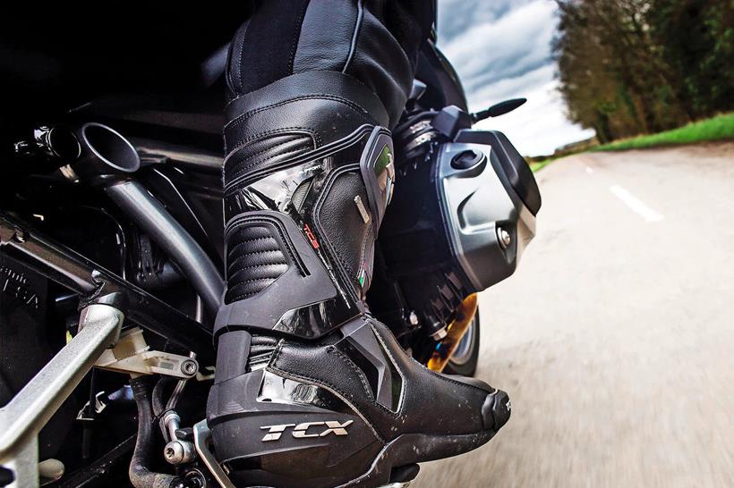 close up of boots on bike