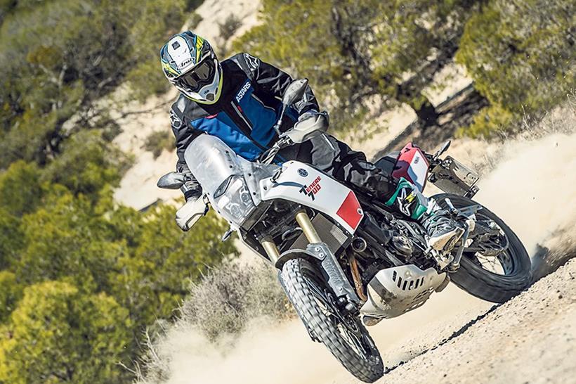 motorcyclist on gravel road