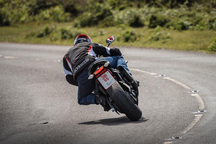 2025-on Buell Hammerhead 1190, rider leaning into a left turn