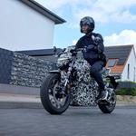 Honda launch second teaser for EV Fun electric motorcycle concept showing it ridden on the road