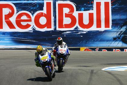 Rossi held off Lorenzo to increase his title lead