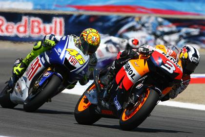 Pedrosa survived a late Rossi attack to end Honda's losing streak