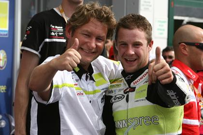 Ronald Ten Kate celebrates with Rea after his Misano win.