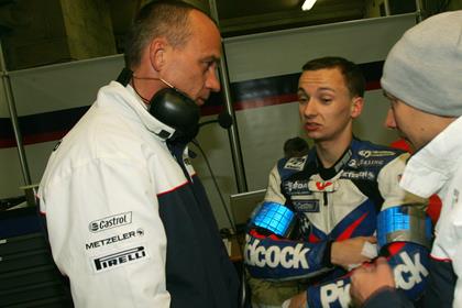 Richard Cooper speaking with Team Manager Rainer Baeumel