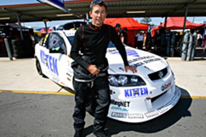 Troy Bayliss with his car