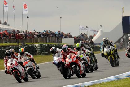 Jorge Lorenzo tagged the back of Nicky Hayden going into the first corner