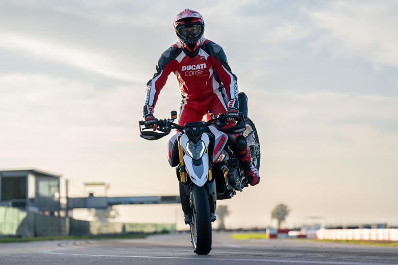 Ducati Hypermotard V2 performing a stoppie
