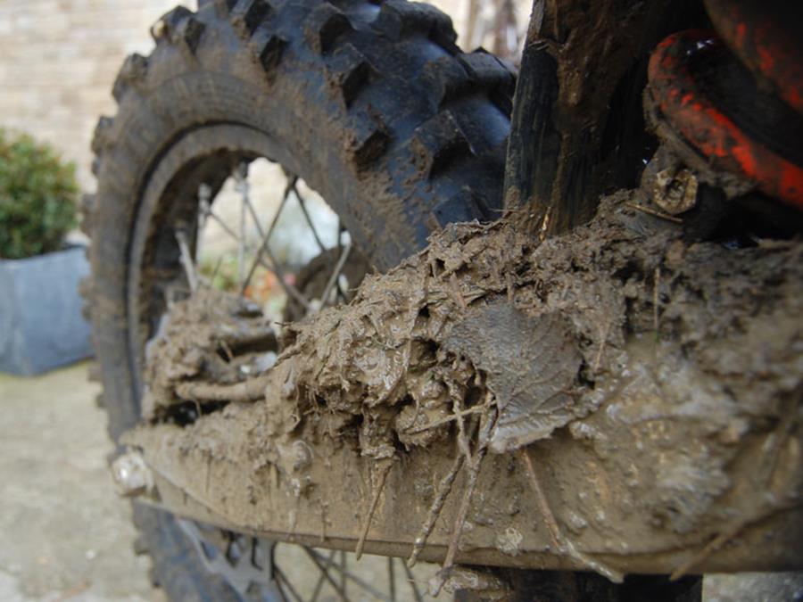 Mud on the KTM 450 EXC swingarm