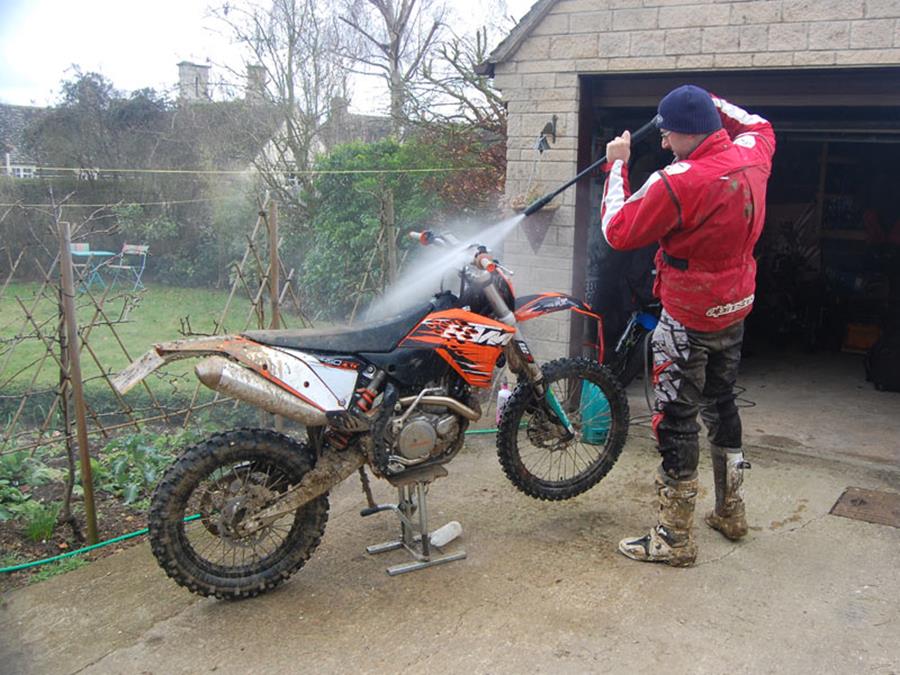 KTM 450 EXC being washed before getting muddy again